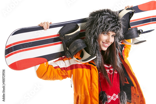 Naklejka na szafę Young woman standing with snowboard isolated on white