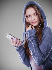 Wall Mural - young woman with smart phone listening music