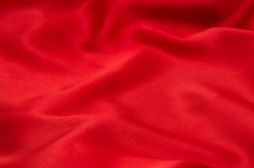 red satin or silk fabric as background