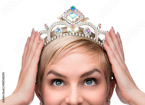 Fotografie, Obraz Beauty queen pageant winner placing tiara on head celebrating individuality inde