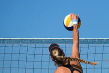 Female Athletes Playing Beach Volleyball