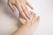 © gemaibarra - Woman hands with cream