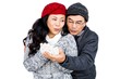 © WavebreakMediaMicro - Couple in sweaters blowing