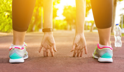 Wall Mural - fitness woman runner stretching before jogging