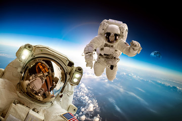 Wall Mural - astronaut in outer space