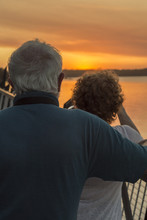 Older Couple Watching Sunset
