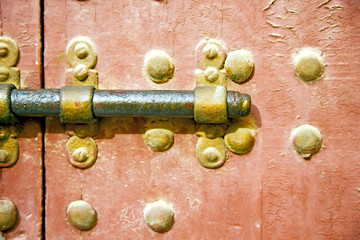 brown  morocco in   the old wood    and rusty safe padlock