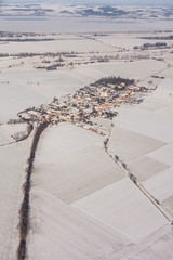 aerial view  over the harvest fields in winter