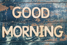 Good Morning Written With Wooden Letters On Rustic Surface
