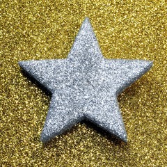 silver star in brilliant yellow background