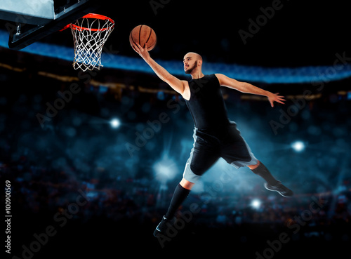 Photo of basketball player makes layup in the game Poster