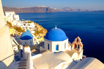 Scenic view of beautiful white houses and blue dones, Santorini