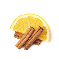 Wall Mural - Orange slice and cinnamon isolated