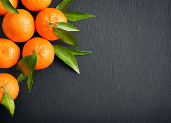 Wall Mural - Tangerines with leaves