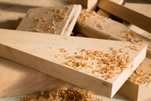 Wooden Sticks Lie On A Workbench In The Carpentry Workshop