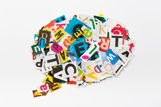 Speech bubble letters in cut out magazine.