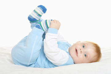 Adorable baby boy on blanket