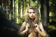 Amazon Curly woman in the forest