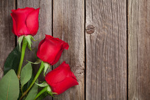 Red Roses Over Wood