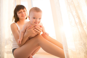 Young mother with her newborn baby