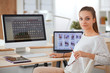 © shefkate - Young woman working in office, sitting at desk