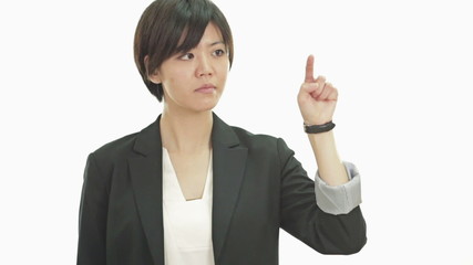 Businesswoman pressing buttons on virtual screen