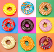 Delicious Donuts isolated on colorful background