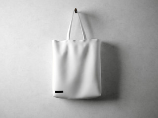 white cotton textile bag holding, neutral background. horizontal 3d render