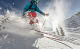 Man freerider running downhill