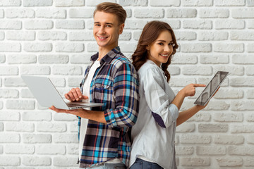 Canvas Print - Young couple in the studio