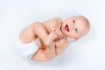little baby wearing a diaper