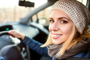 Wall Mural - Woman driving a car