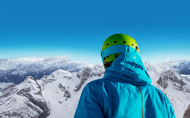 Canvas Print - Back of skier during sunny day.