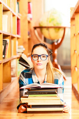 Wall Mural - Woman student in college library