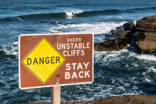 Warning Sign Of Unstable Cliffs At Sunset Cliffs In San Diego, California. 
