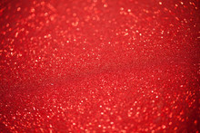Red Glitter Surface With Red Light Bokeh - It Can Be Used For Background For Special Occasions Promotion Campaign Or Product Display