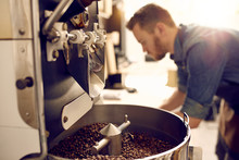 Freshly Roasted Coffee Beans In A Modern Machine
