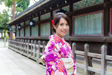 Canvas Print - Asian Woman wearing the kimono dress at temple