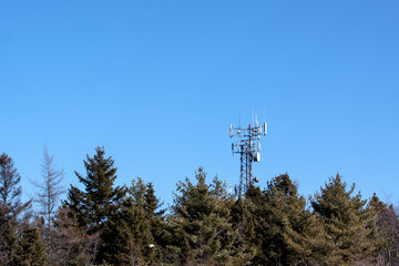 transmission tower on blue sky