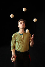 Young Boy Juggling