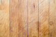 Rough wooden used cutting board background with vertical lines and cutting traces