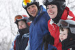 © Janet Kimber/Blend Images - Caucasian family wearing ski gear in snow