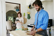 © Peathegee Inc/Blend Images - Pregnant Caucasian couple cooking in kitchen