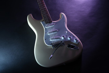 Canvas Print - Part of electric guitar, on dark lighted background