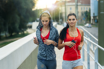 Active female joggers running outdoors