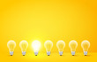 Standing in a row light bulbs with glowing one on yellow background. Unlike others or odd man out concept. Vector illustration.