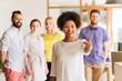 © Syda Productions - woman pointing to you over creative office team