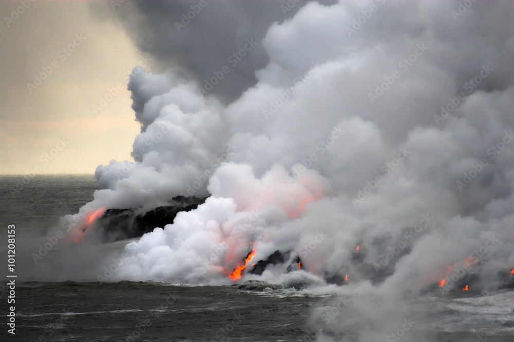 Lava flowing into the ocean - obrazy, fototapety, plakaty 