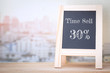 © sitthiphong - Concept Time Sell 30%  message on wood boards