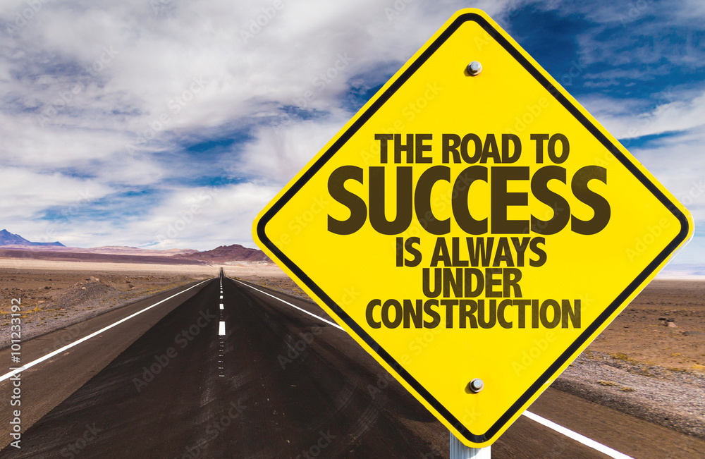 The Road to Success is Always Under Construction sign on desert